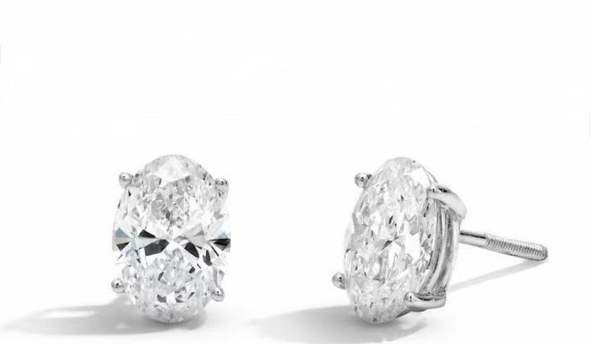 Piękne kolczyki o łącznej masie 1ct w białym złocie 750